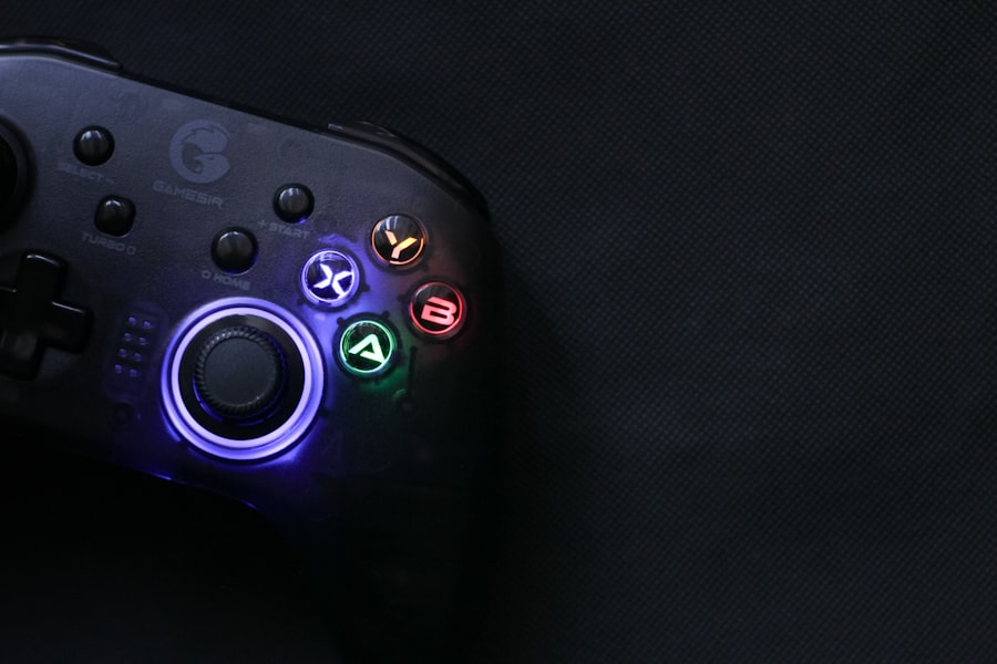 Illuminated game controller on a dark surface