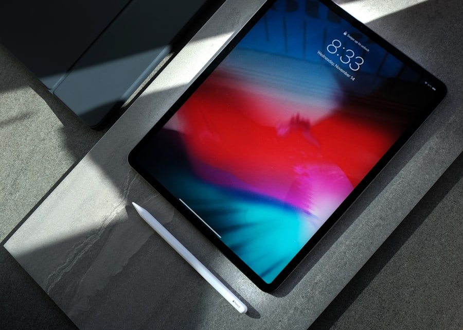Tablet and stylus on a dark work surface