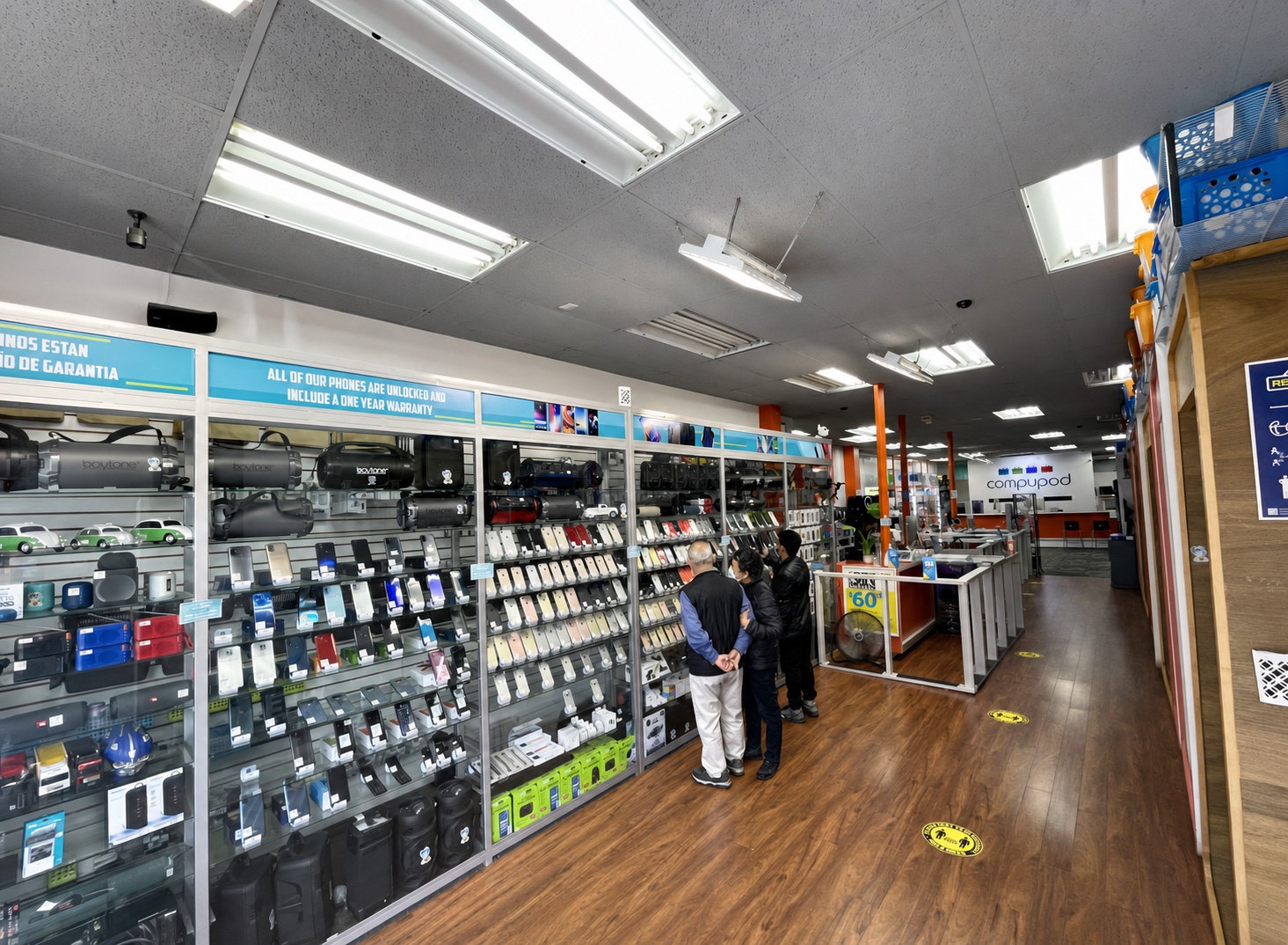 Inside Compupod with phones, computers, accessories, and other electronics on display
